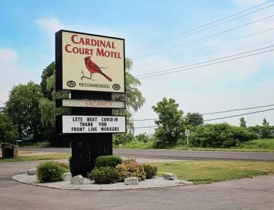 Cardinal Court Motel Road Sign
